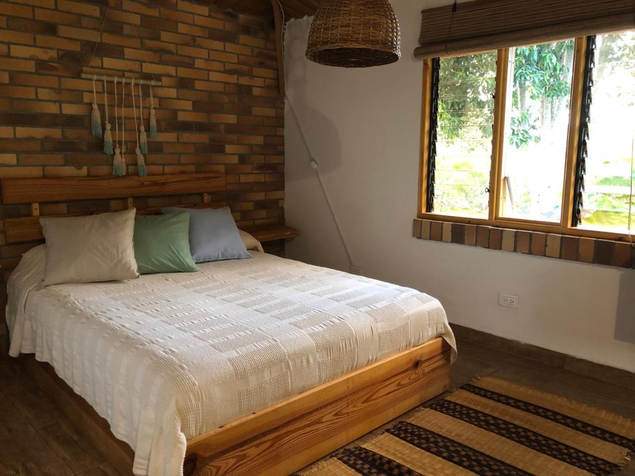 Tribu Ecohostal Лос Сантос Екстериор снимка